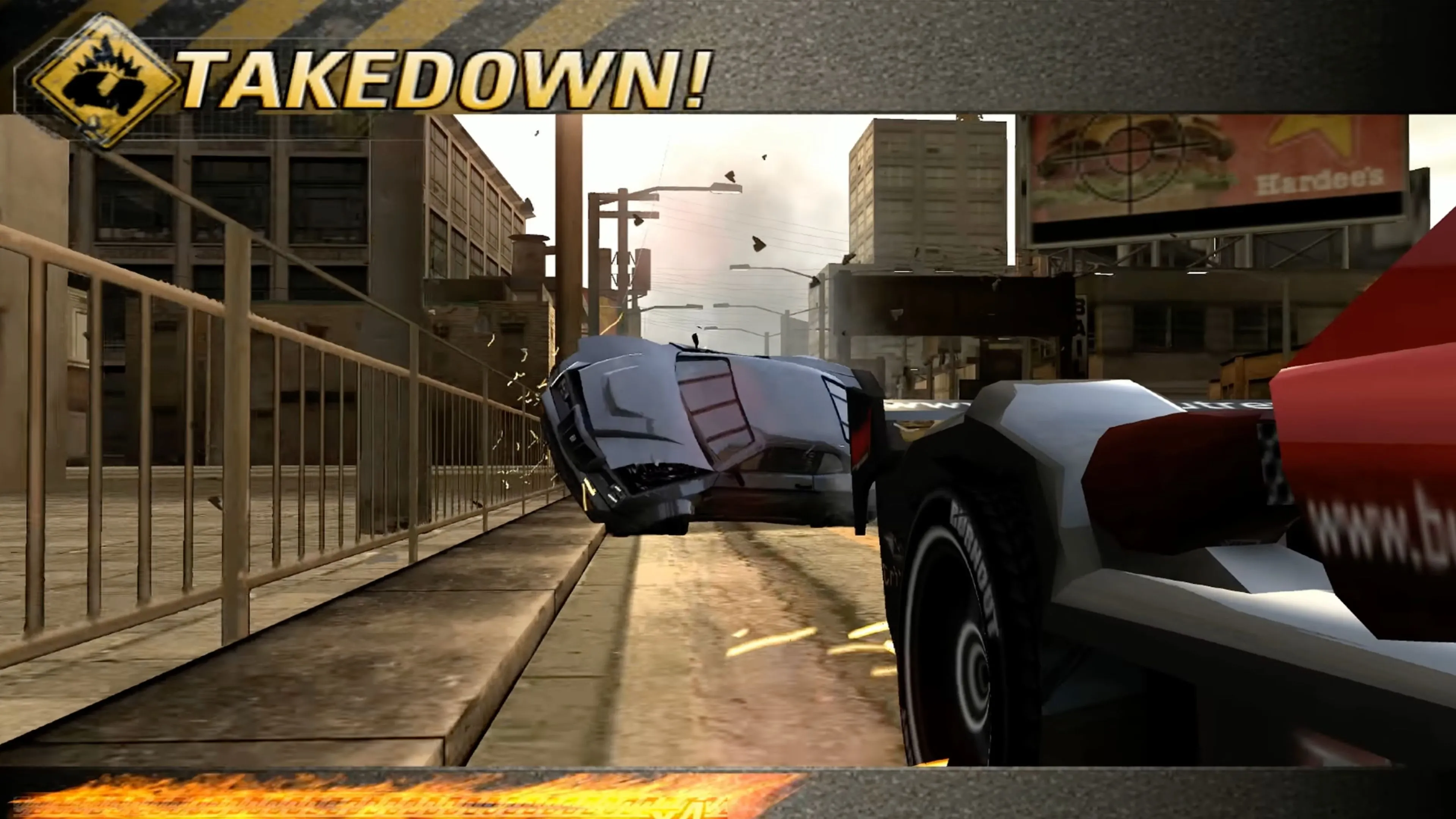 Ảnh chụp màn hình trong game Burnout Revenge với hiệu ứng cháy nổ