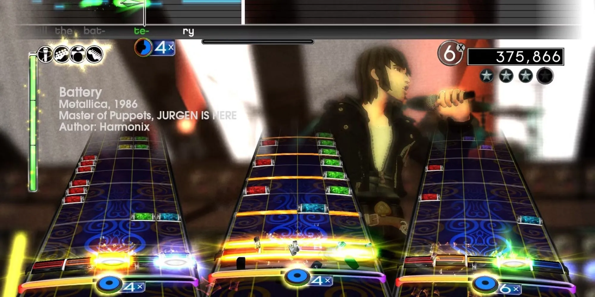 Ba người chơi đang biểu diễn nhạc cụ trong game Rock Band 2.
