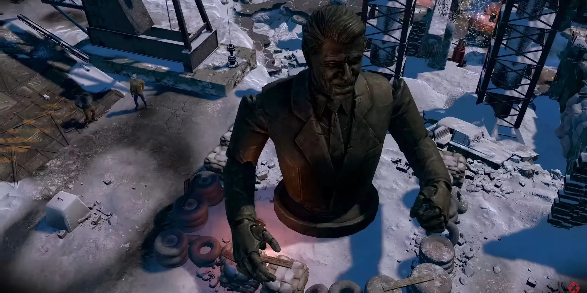 Bức tượng Ronald Reagan khổng lồ bị phá hủy một phần trong khung cảnh tuyết rơi của Wasteland 3