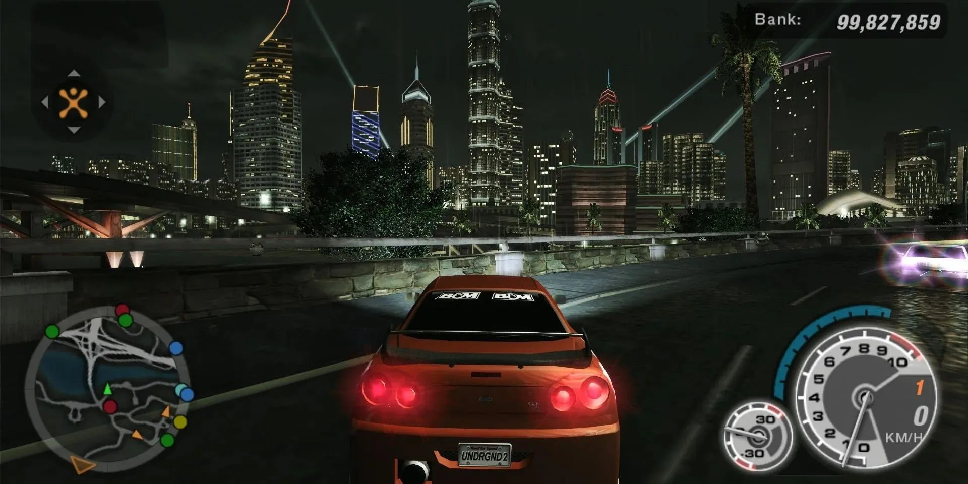 Chiếc Nissan Skyline lướt trên đường phố đêm trong Need For Speed Underground 2