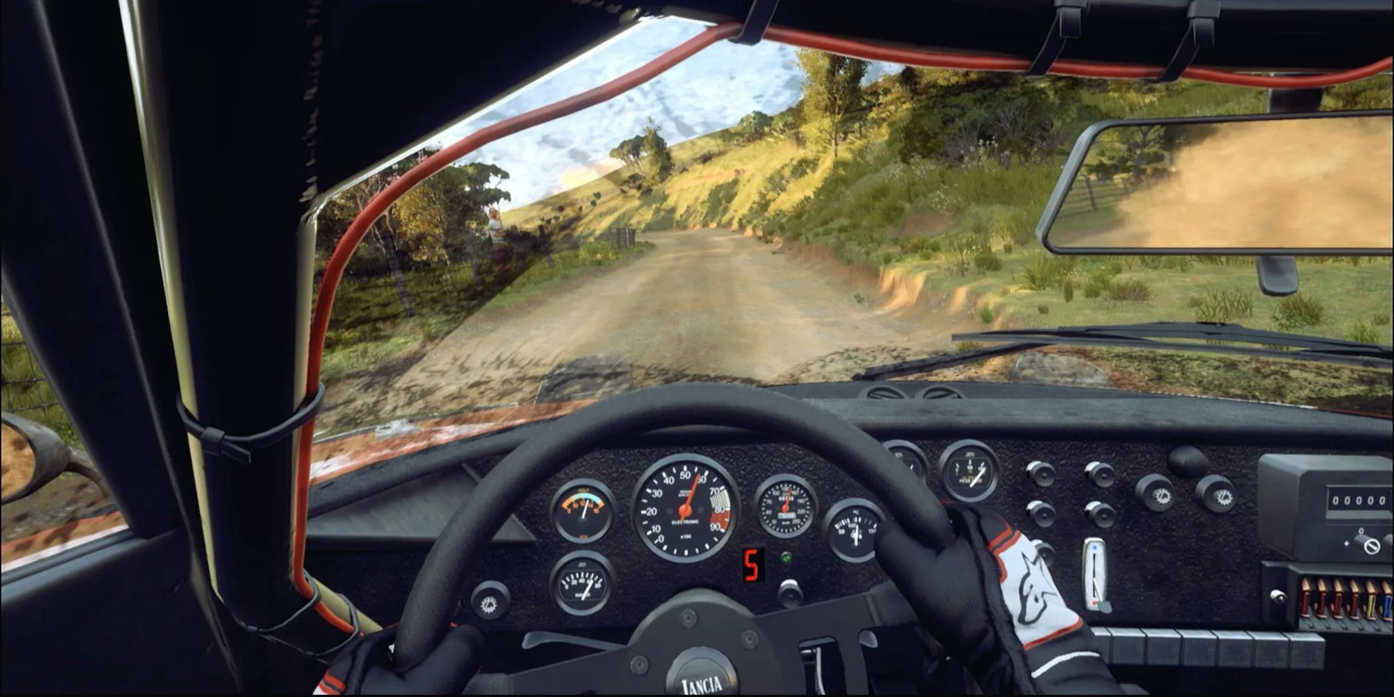 Góc nhìn buồng lái trong DiRT Rally 2.0 khi tắt HUD, dựa vào buồng lái và người đồng hành