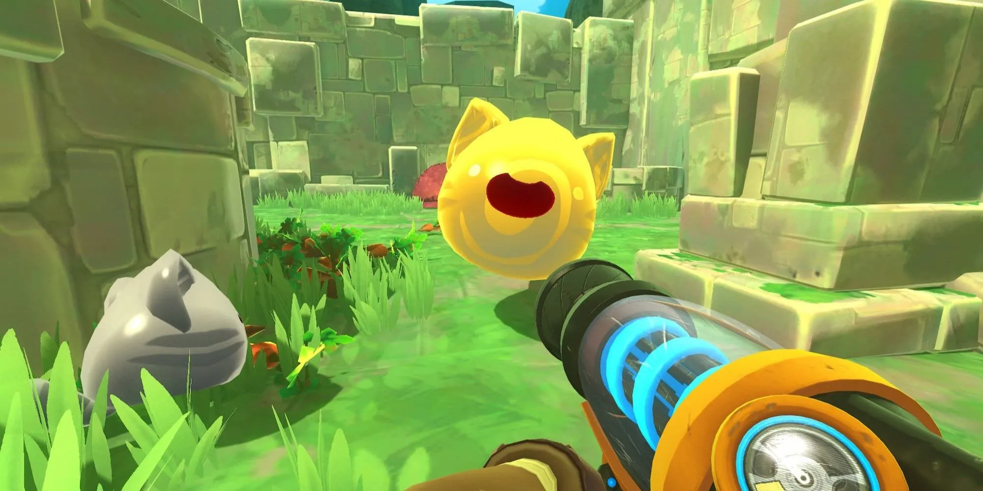 Một chú slime hồng đang mỉm cười vui vẻ trong game Slime Rancher