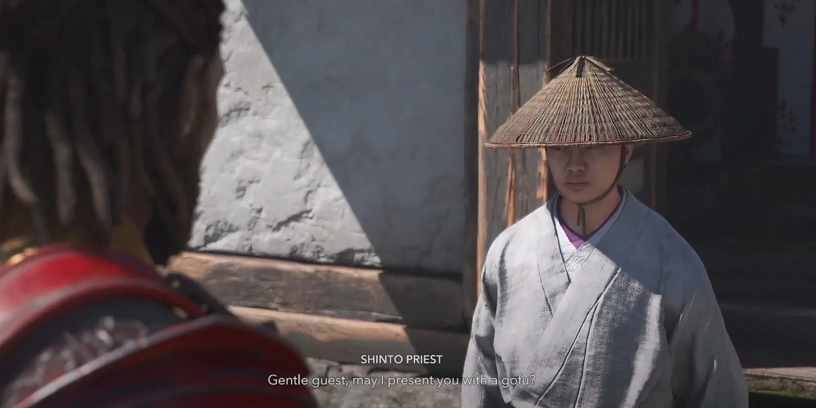 Yasuke nhận bùa Gofu từ Thầy tế Shinto tại đền Shirahige, hoàn thành nghi lễ thanh tẩy trong AC Shadows
