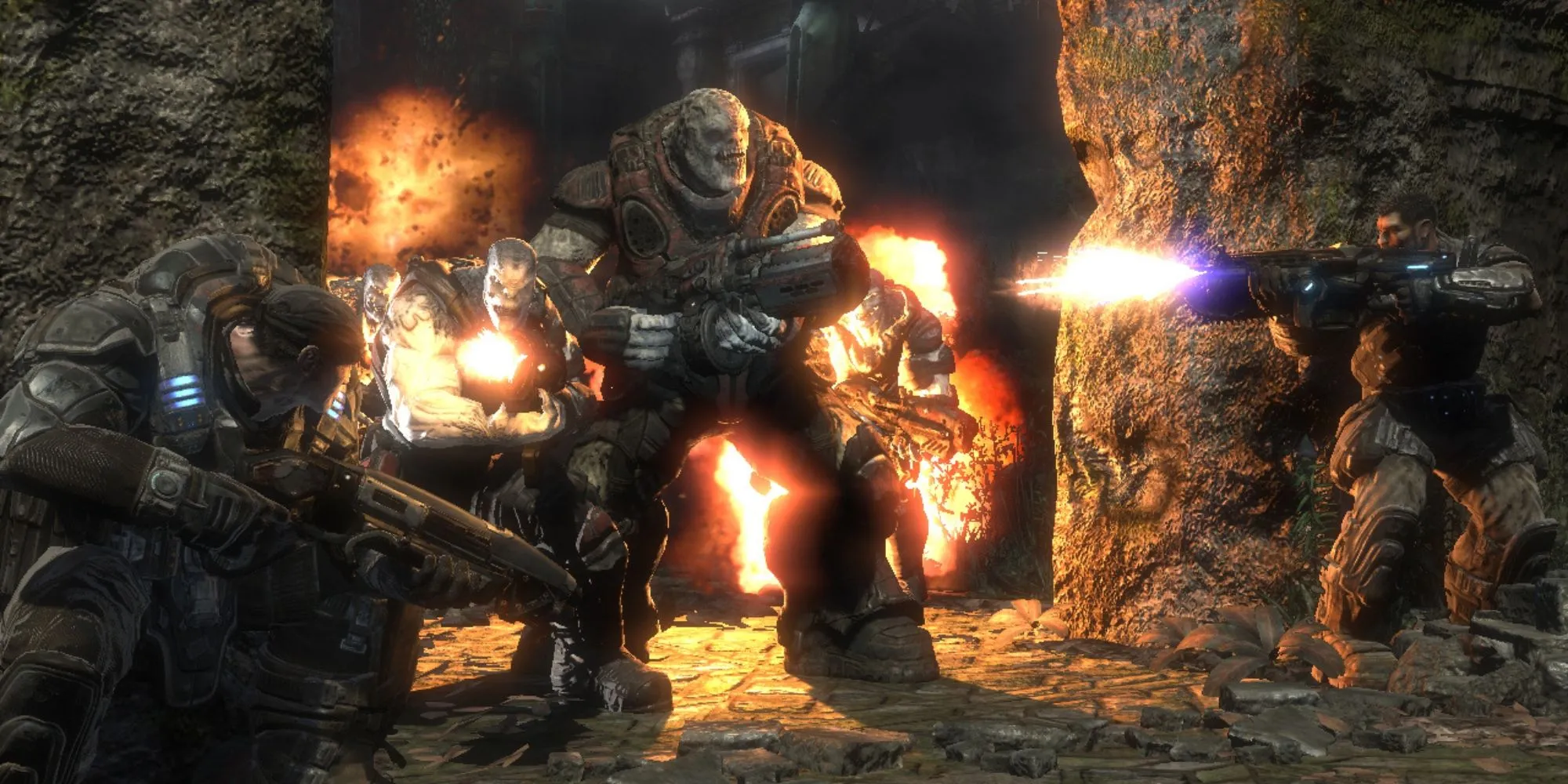 Ba nhân vật chính của Gears of War đứng giữa khung cảnh chiến trường đổ nát, thể hiện chi tiết mô hình nhân vật và môi trường ấn tượng