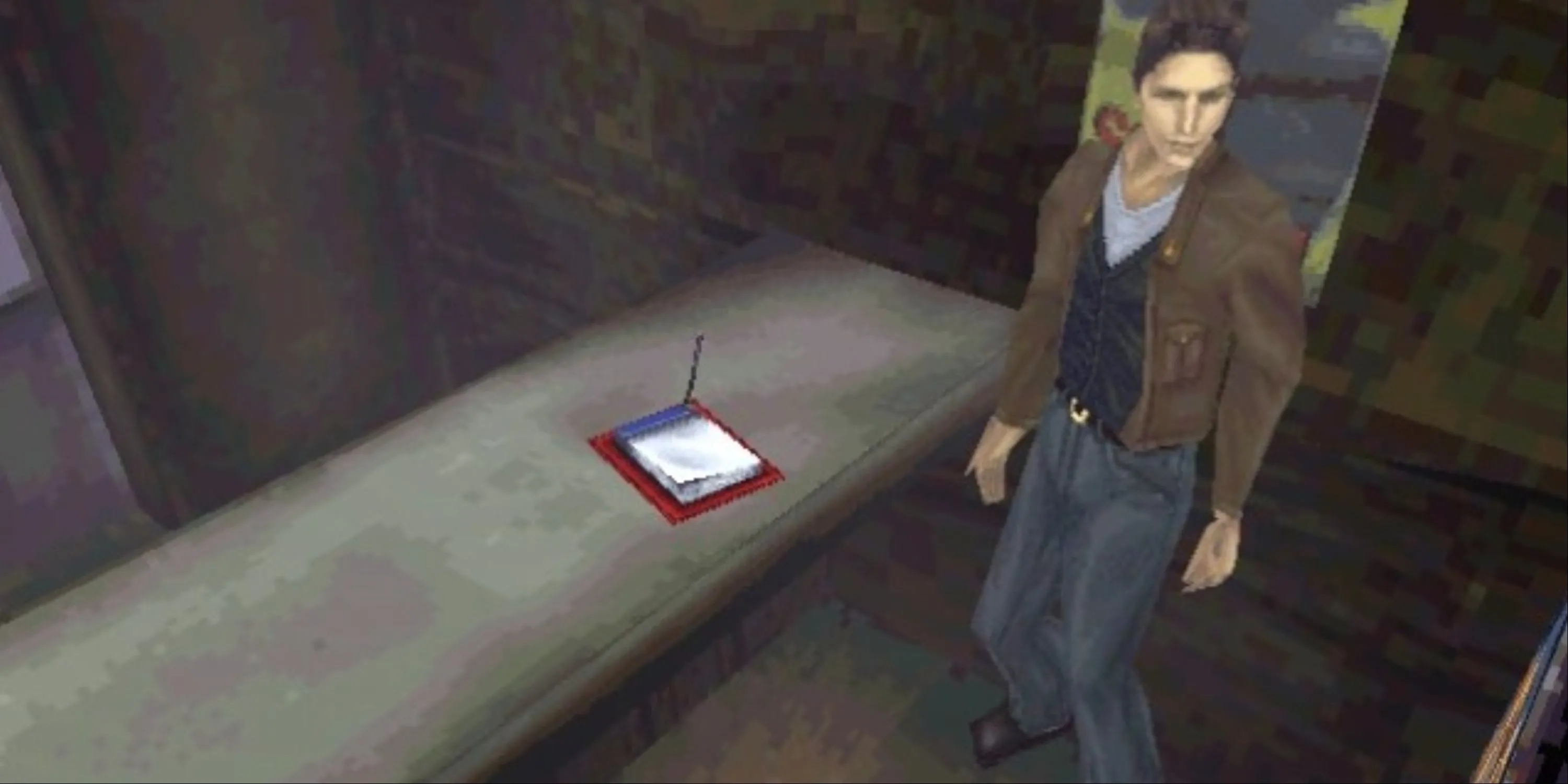 Harry đứng bên điểm lưu game (notepad save point) trong Silent Hill bản gốc