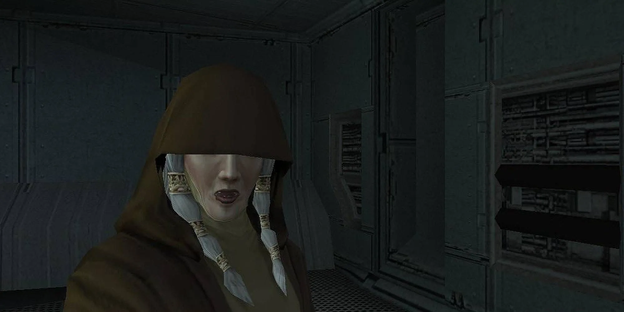 Kreia, người phụ nữ trùm áo choàng bí ẩn, đứng trong khoang tàu vũ trụ từ Star Wars: Knights of the Old Republic II - The Sith Lords